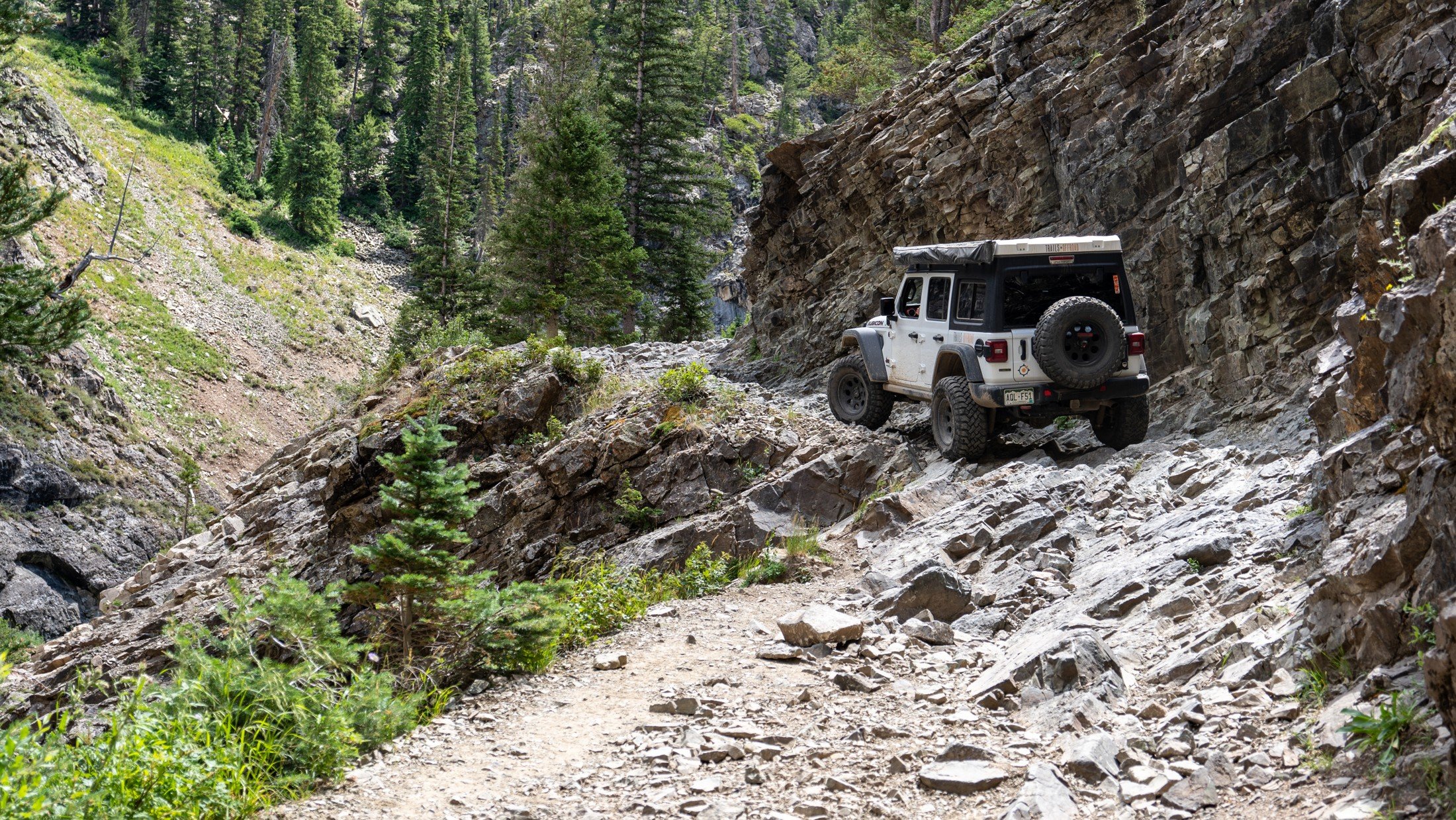 jeep driving on gothic road in crested butte, colorado