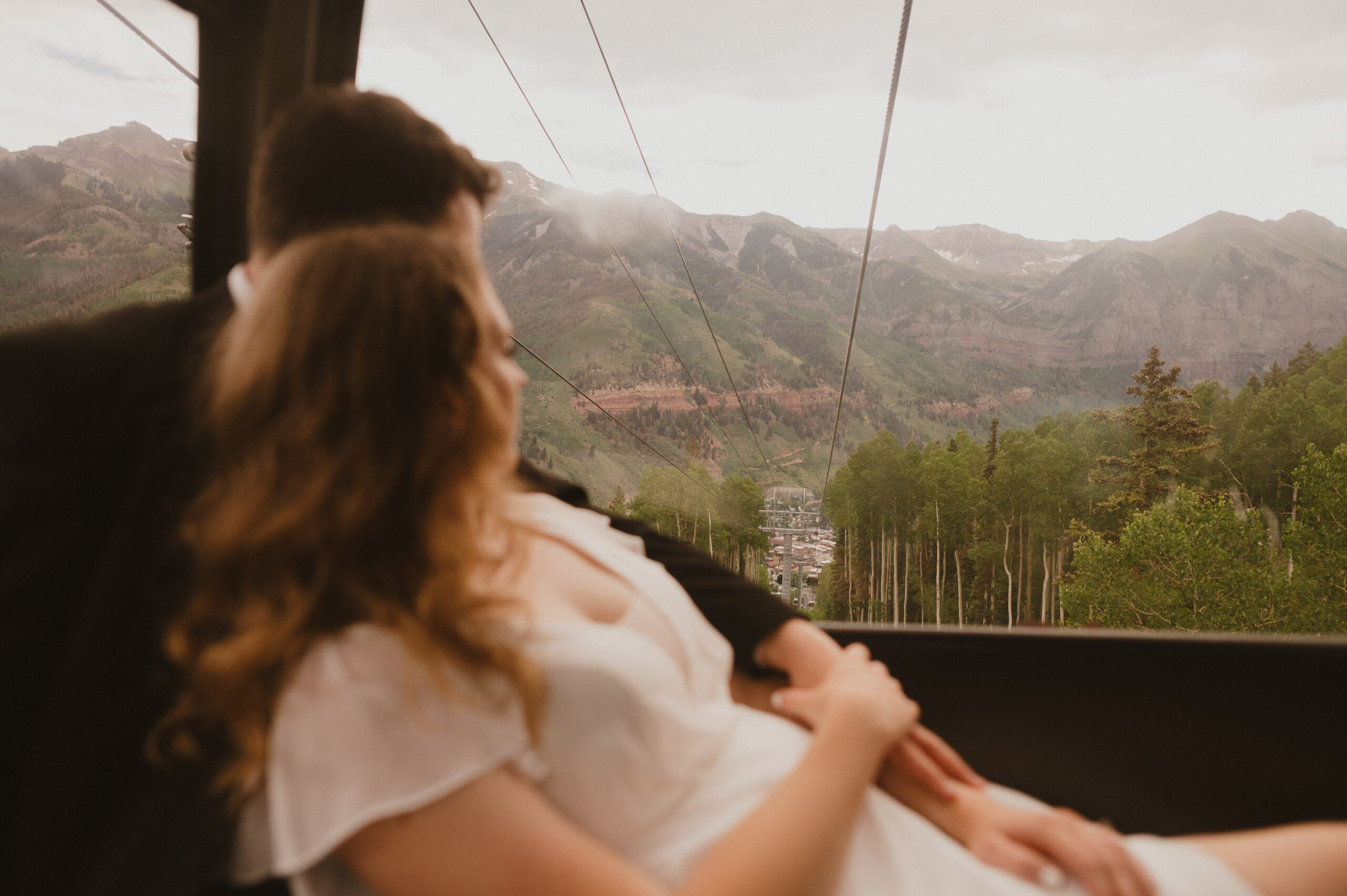 Wedding couple in gondola in telluride colorado