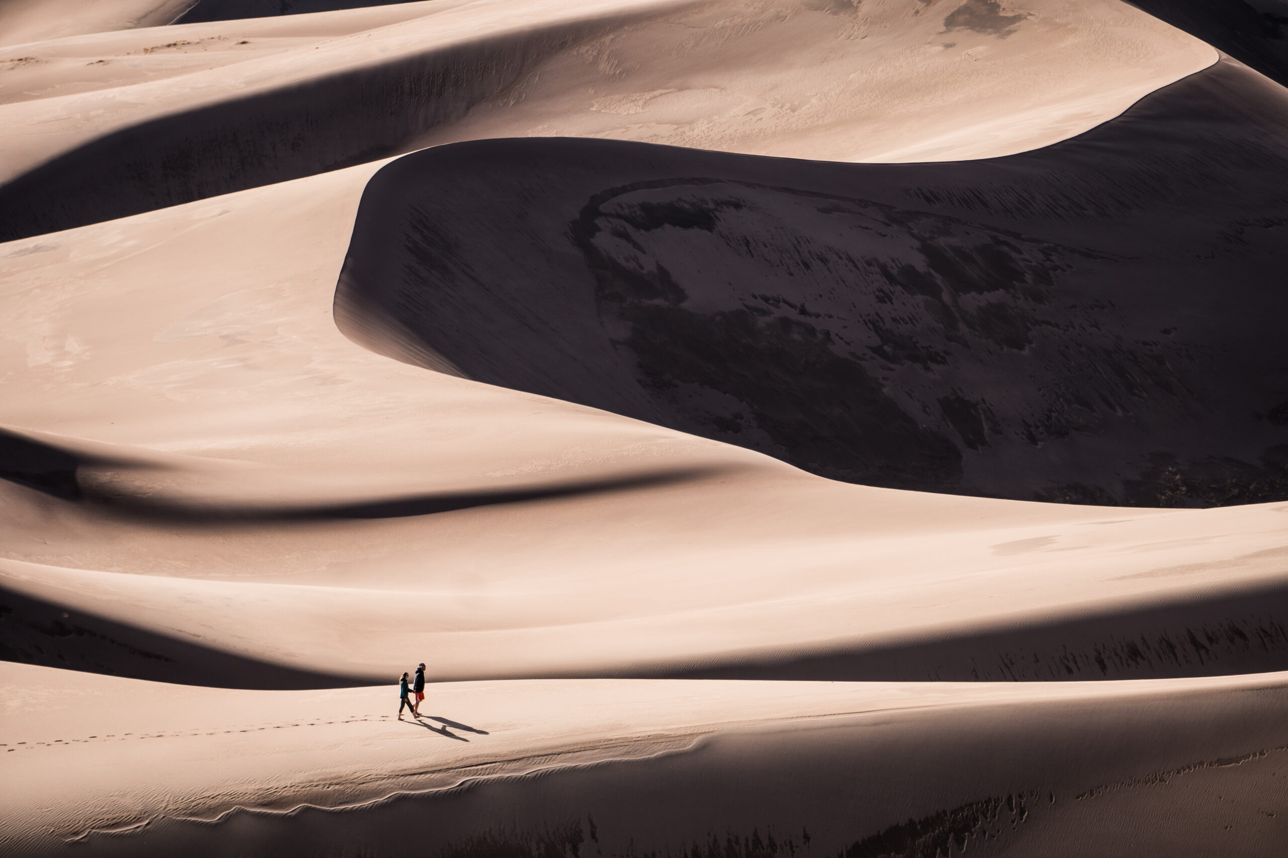 Great Sand Dunes National Park in Colorado, couple walking