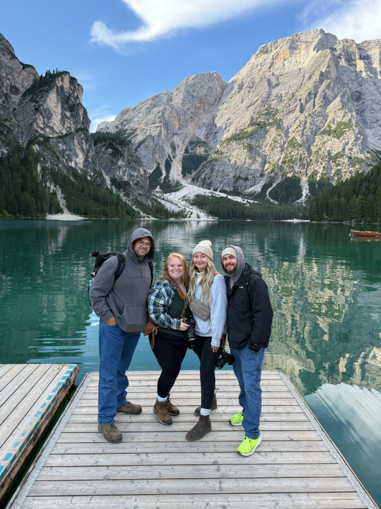 group of people standing on dock in italy